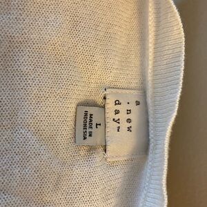 Very nice white with black striped cardigan